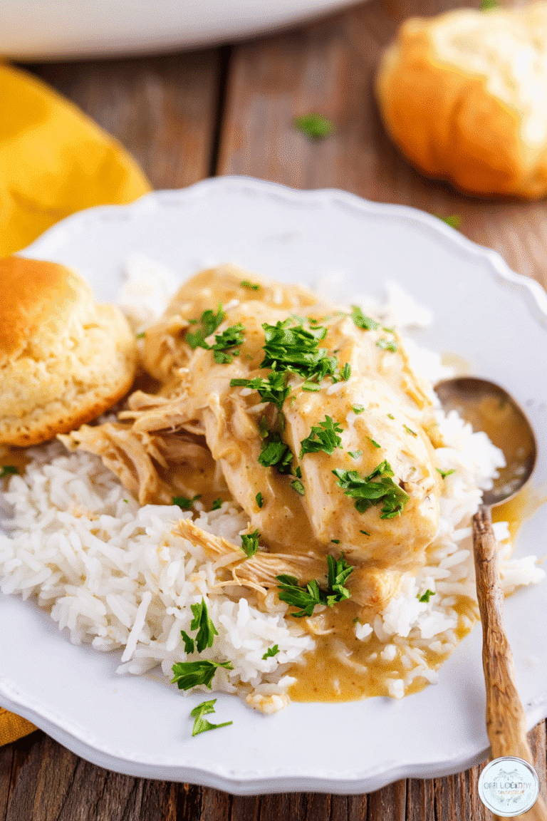 Low Cooker Chicken Breasts and Gravy on a rustic wood